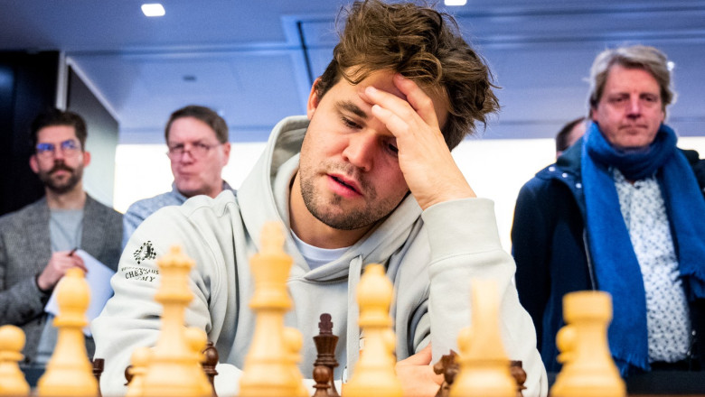 Un număr impresionant de jucători s-au alăturat confruntării „Magnus Carlsen - Restul Lumii”. Câți șahiști s-au mobilizat pentru a-l provoca pe fostul campion mondial? 1 record de participanti la partida de sah magnus carlsen restul lumii cati sahisti s au unit sa l invinga pe fostul campion mondial 6834d57ded07f