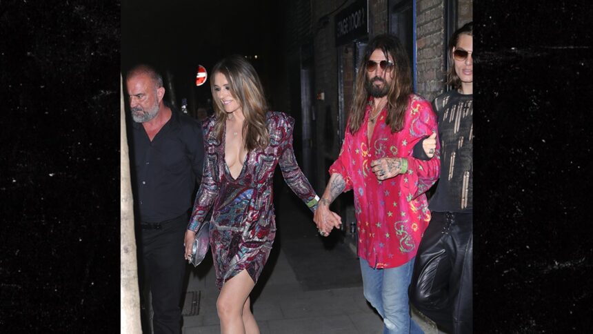 Elizabeth Hurley și Billy Ray Cyrus la premiera filmului lui Miley Cyrus în Londra 1 elizabeth hurley and billy ray cyrus attend miley cyrus film in london 6858013320b26