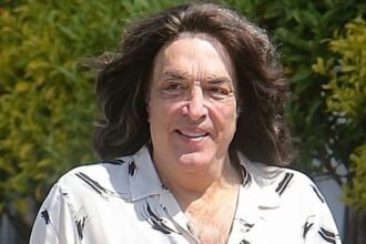 iconic 80s lead singer who was born without an ear looks unrecognizable in rare outing can you guess who 685dcca402c05