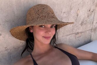 kendall jenner tans in tiny black bikini on desert trip 684a2be5ade6d