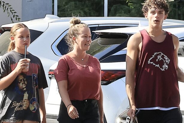 kendra wilkinsons son 15 towers over her as she steps out with her two kids after turning 40 685c2560345ec