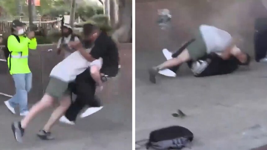 Poliția din L.A. reține doi bărbați după ce un videoclip viral arată o confruntare la protestul împotriva ICE 1 l a cops arrest two men after ice protest body slam video goes viral 684c8f83de2cc