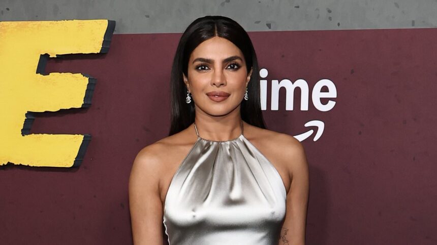 Priyanka Chopra renunță la sutien într-o rochie argintie care îi pune în evidență silueta, strălucind la premiera filmului "Heads of State". 1 priyanka chopra ditches bra in figure hugging silver gown as she leads the stars at heads of state premiere 685b7f81598bf