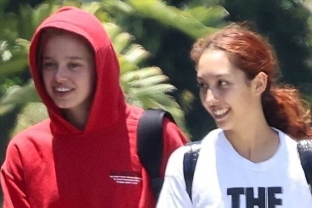 angelina jolies mini me shiloh proves shes no fashion snob as she recycles old 50 hoodie when out with gal pal 68755c86df70c