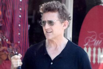 exclusiveiconic 80s star looks shockingly youthful on his 60th birthday during rare outing can you guess who it is 6879458c9e014