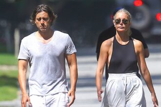 gwyneth paltrow is bra free in a skimpy top during tense walk with husband brad falchuk in the hamptons 686c23a4192dd