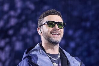 justin timberlake caught on camera in intense exchange at english music festival 68758ddbb5bfa