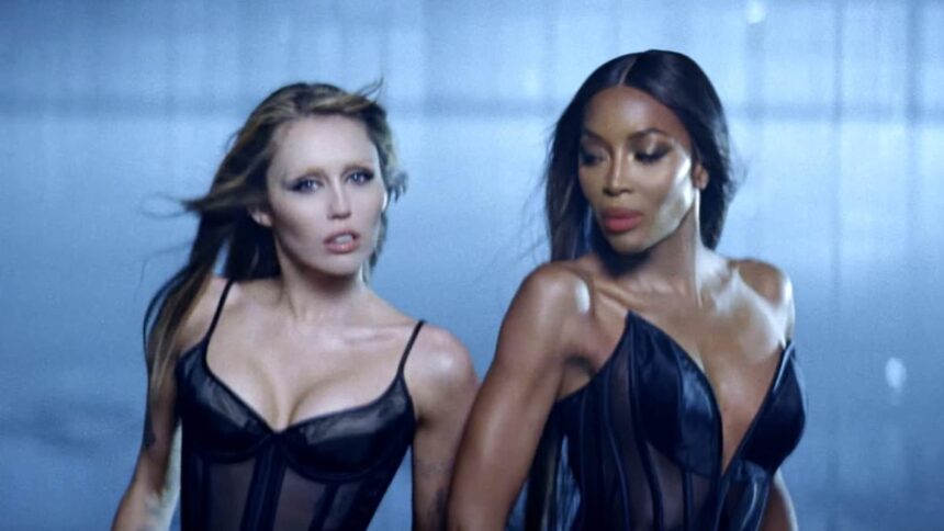 miley cyrus and naomi campbell strip down to their lingerie as they team up for raunchy new music video after furious fans accused them of being being rude and dismissive 6863aaf955680