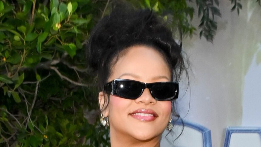 pregnant rihanna makes red carpet debut with both sons at the smurfs premiere in la 687489740be4f