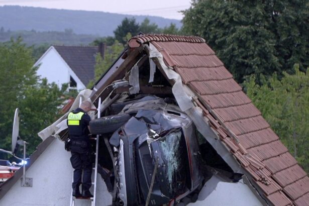 two seriously injured as car crashes into barn roof in germany 687e1071c7a7a