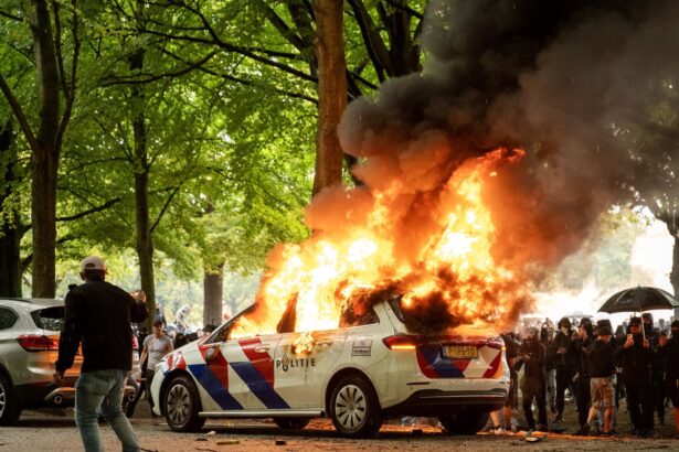 dutch police clash with anti immigration protesters in the hague 68cee0a75a9e8