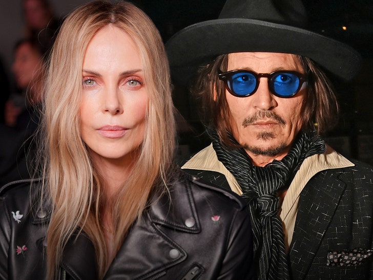 Charlize Theron îi întoarce spatele lui Johnny Depp la prezentarea Dior 1 charlize theron seemingly gives cold shoulder to johnny depp at dior show 68e3b845341b5