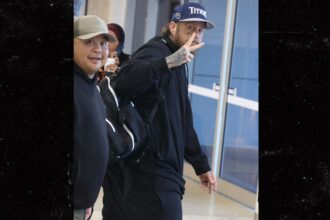 jelly roll shows off epic 200lbs weight loss after landing in sydney 68f827652e597