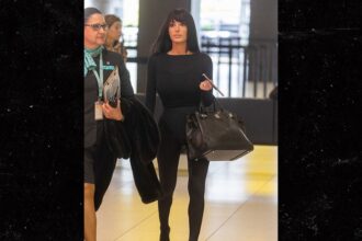 bianca censori shows off butt in thong bodysuit at airport 690d52523b376
