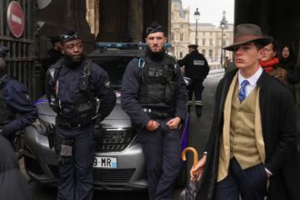 who is fedora man dapper french teenager in viral louvre heist photo unmasked 6911a47a3594b